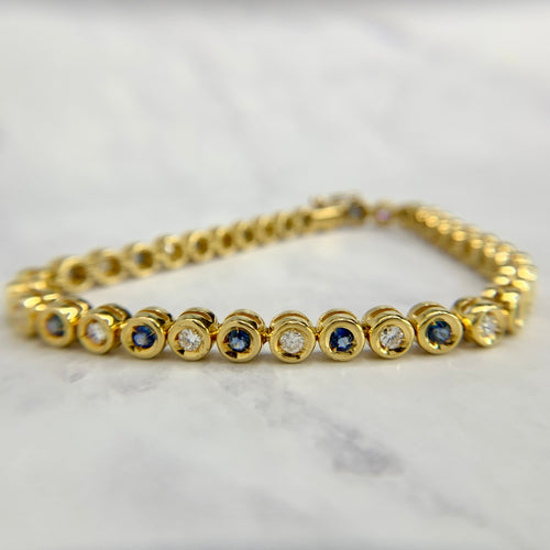 18K Yellow Gold Sapphire and Diamond Bezel Tennis Bracelet