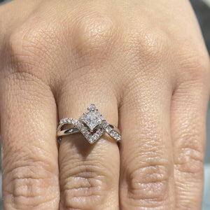 14K White Gold Princess Cut Center w/ Bypass Round white Diamonds.