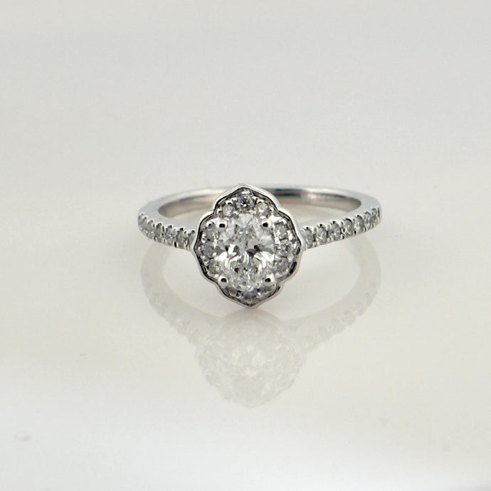 Vintage 14k White Gold Oval Center with round Cut Diamond Halo Ring